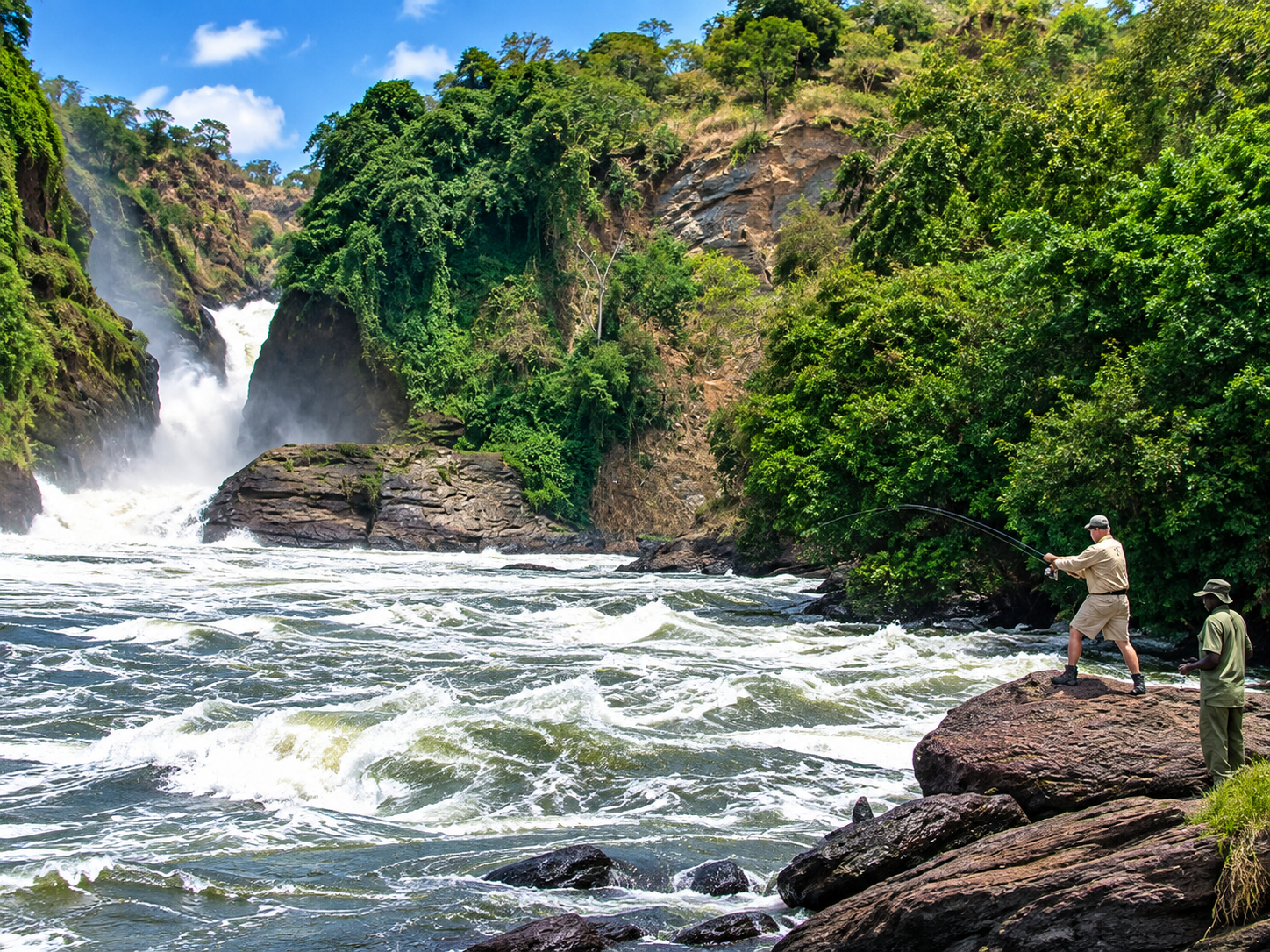 Uganda Fishing Safaris – Nile Perch Fishing Adventures Angler fishing below Murchison Falls on the River Nile in Uganda