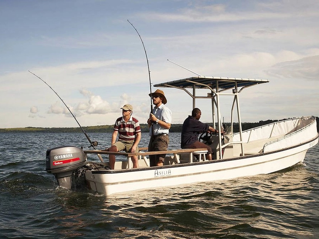 Lake Victoria Fishing Safaris | Peter’s Fishing Tours Uganda Fishing boat used for Lake Victoria fishing targeting trophy Nile perch in Uganda